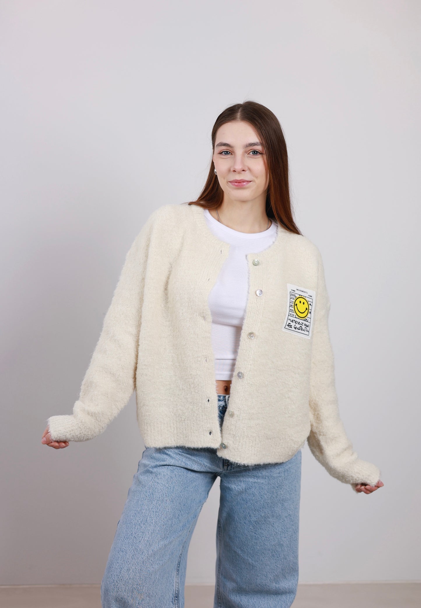 Kuschelige Strickjacke mit Smiley Patch - creme